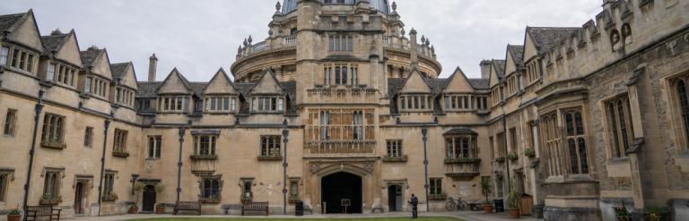 The quad of Brasenose College, with the dome of the Radcliffe Camera rising in the background.